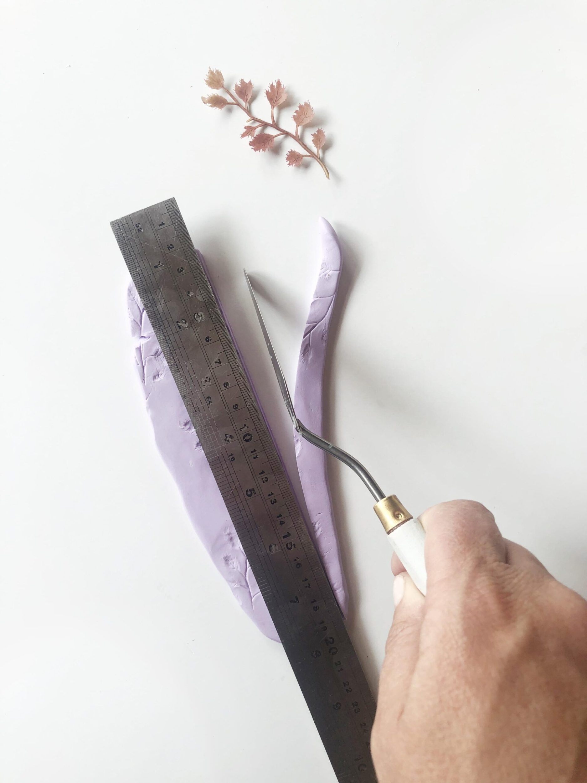 Soft clay being cut in half