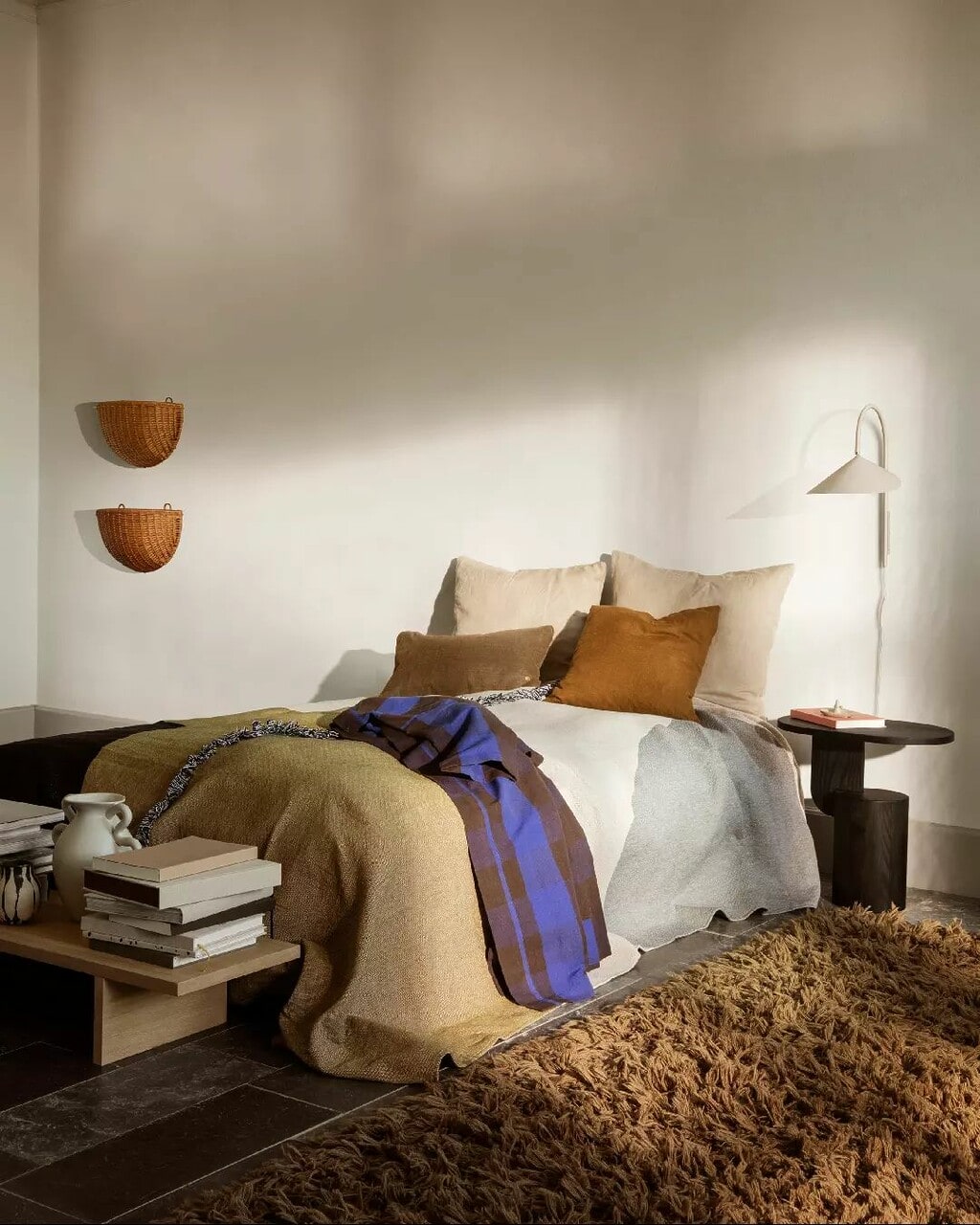 colourful bedding sheets in an otherwise neutral home. Shown by @fermliving. 