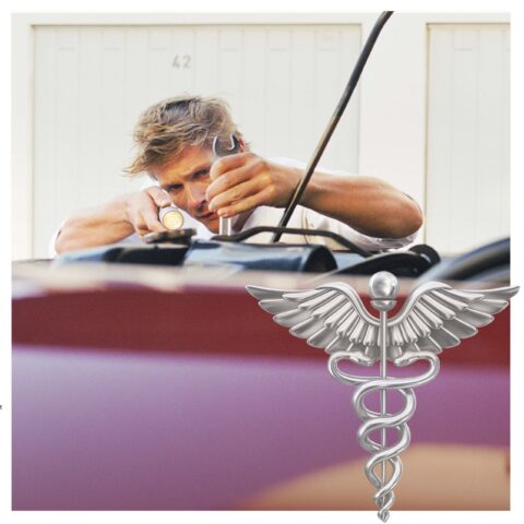 A man fixing a car