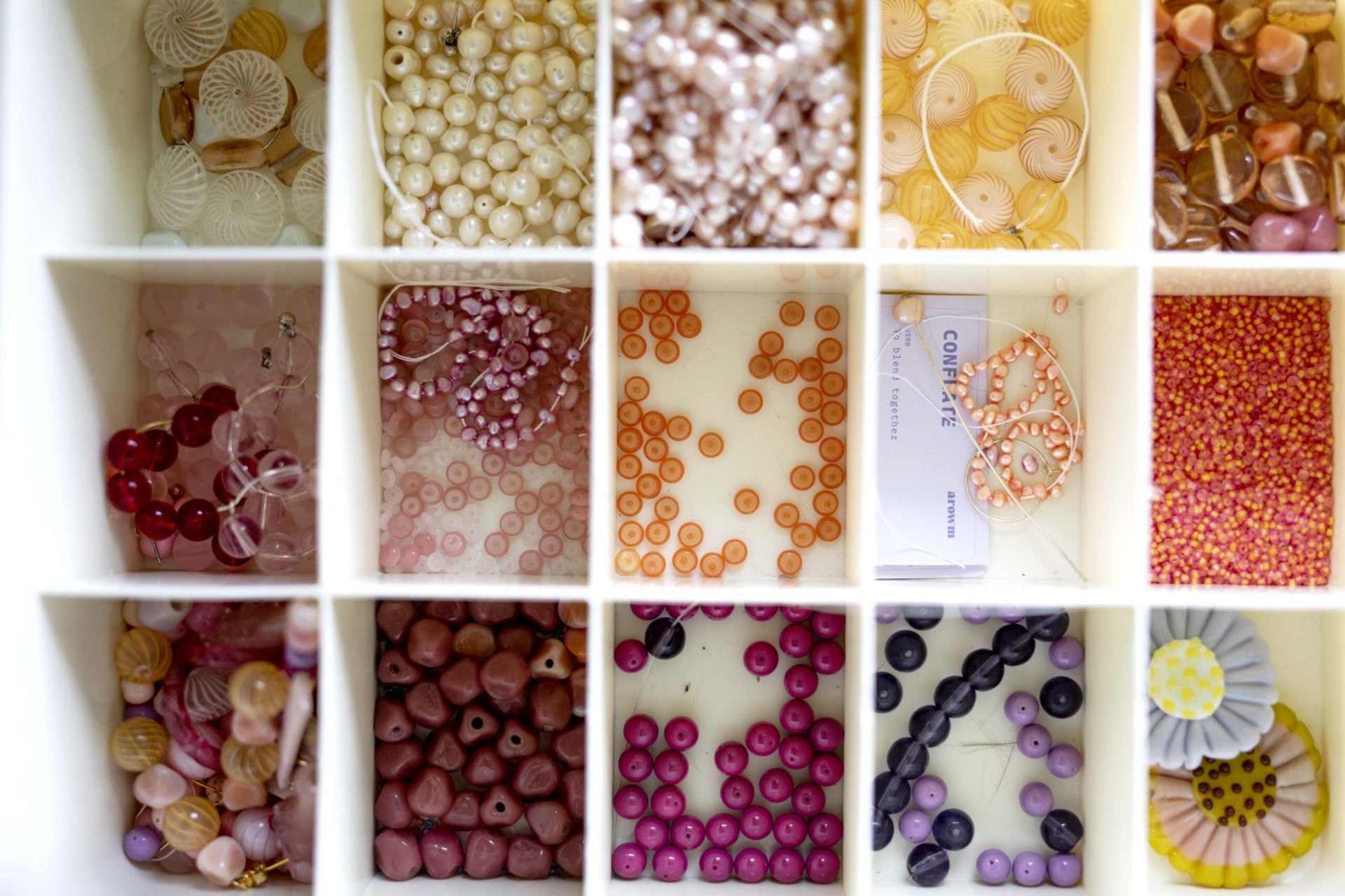 Boxes of colourful jewellery beads