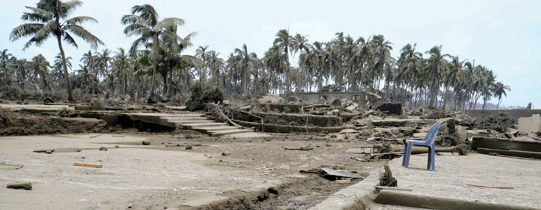 TOPSHOT - This photo taken on January 16, 2022 shows destroyed beach resorts in the Hihifo district of Tonga's main island Tongatapu following the January 15 eruption of the nearby Hunga Tonga-Hunga Haapai underwater volcano. (Photo by Mary Lyn FONUA / Matangi Tonga / AFP) (Photo by MARY LYN FONUA/Matangi Tonga/AFP via Getty Images)